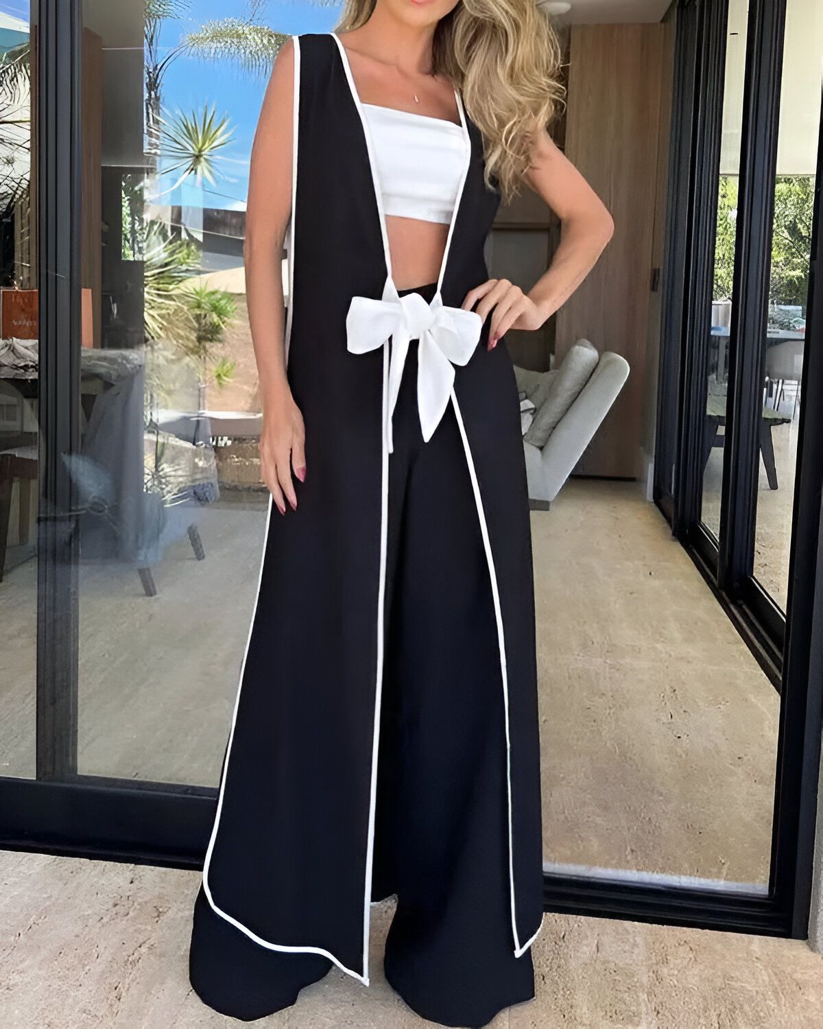 Ensemble manteau long et pantalon large avec reliure contrastee et details noues