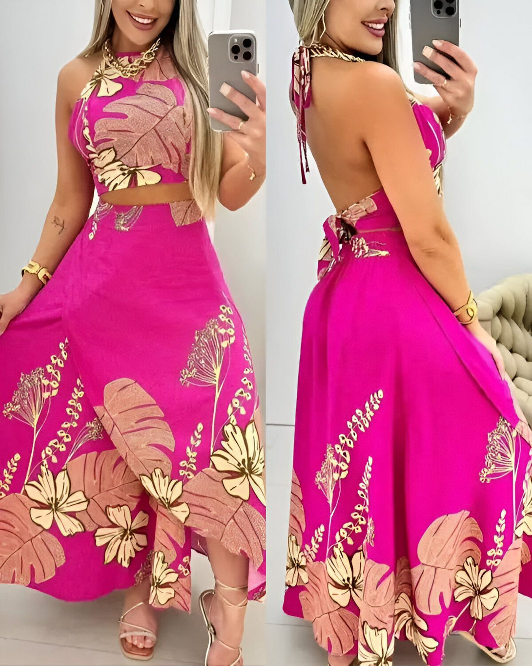 Une femme porte un ensemble jupe et crop top rose fuchsia. Le crop top est court et noué dans le cou. La jupe est longue et fendue sur le côté. L'ensemble est imprimé de feuilles tropicales et de fleurs.