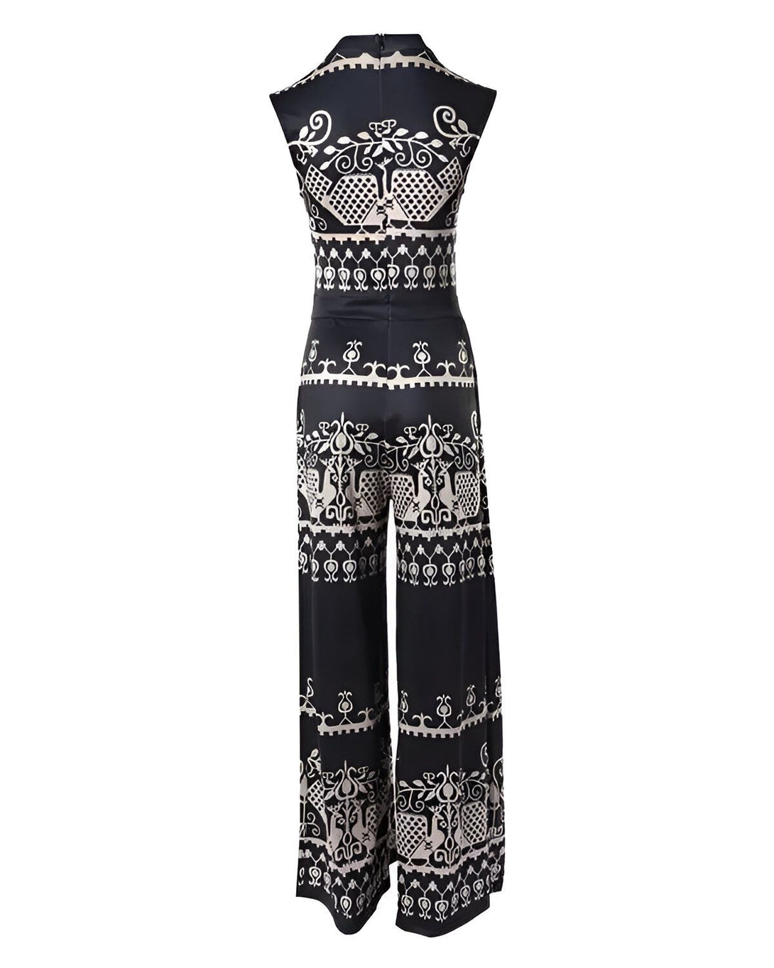 Une combinaison pantalon noire et blanche avec un motif géométrique.