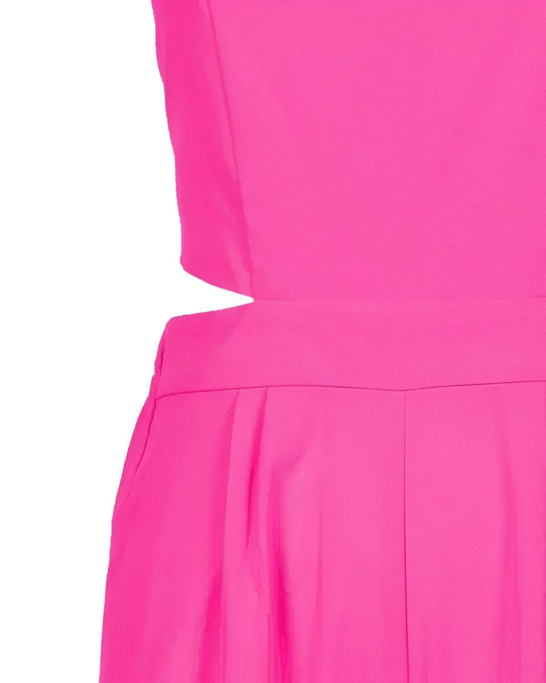 Une combinaison-pantalon rose vif avec une découpe sur le côté.