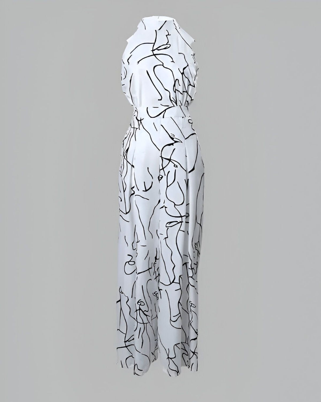 Une combinaison pantalon blanche avec un motif de croquis de corps humains noirs.