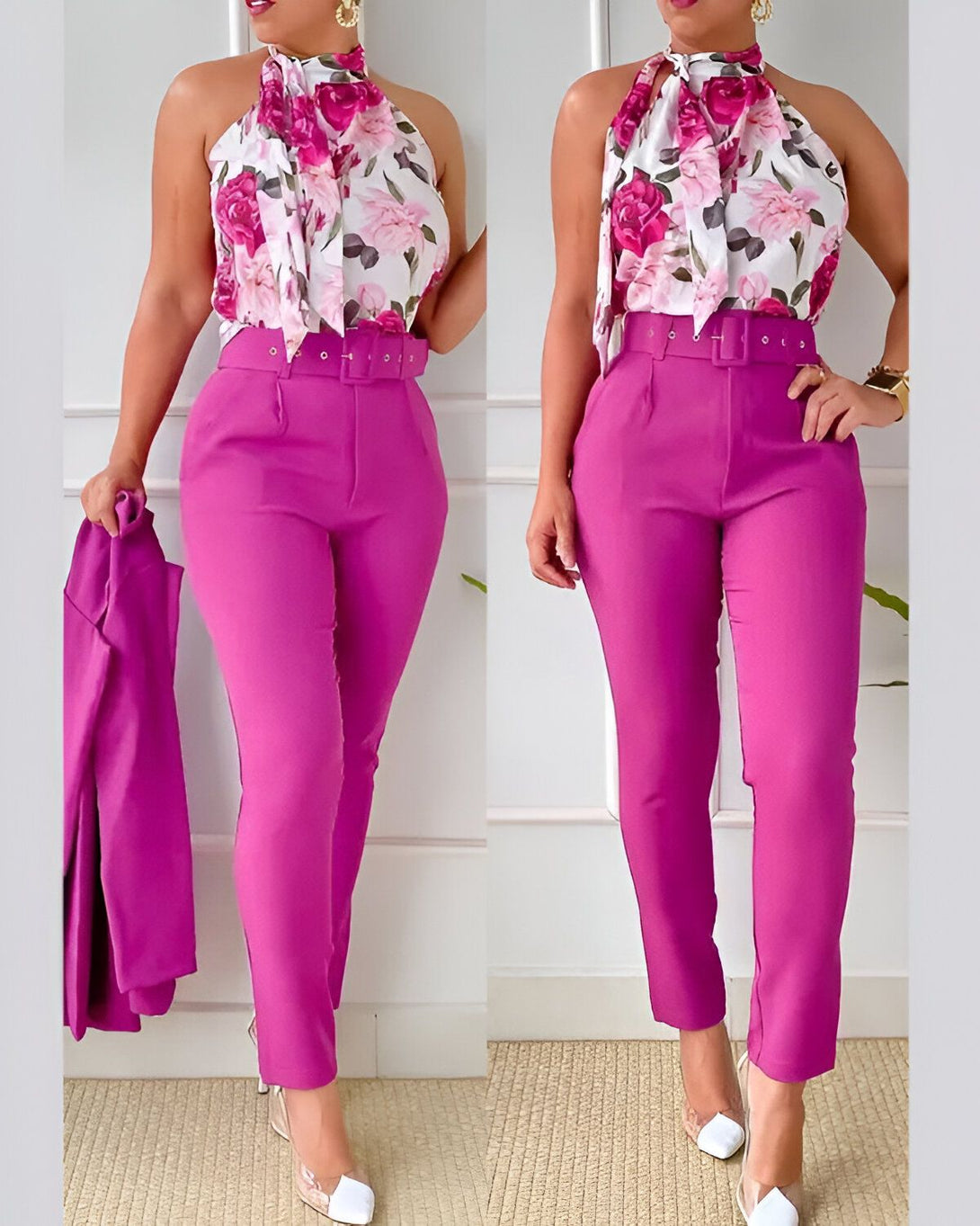 Une femme porte un tailleur pantalon rose fuchsia et un chemisier à fleurs. Elle porte également une ceinture et des escarpins blancs.