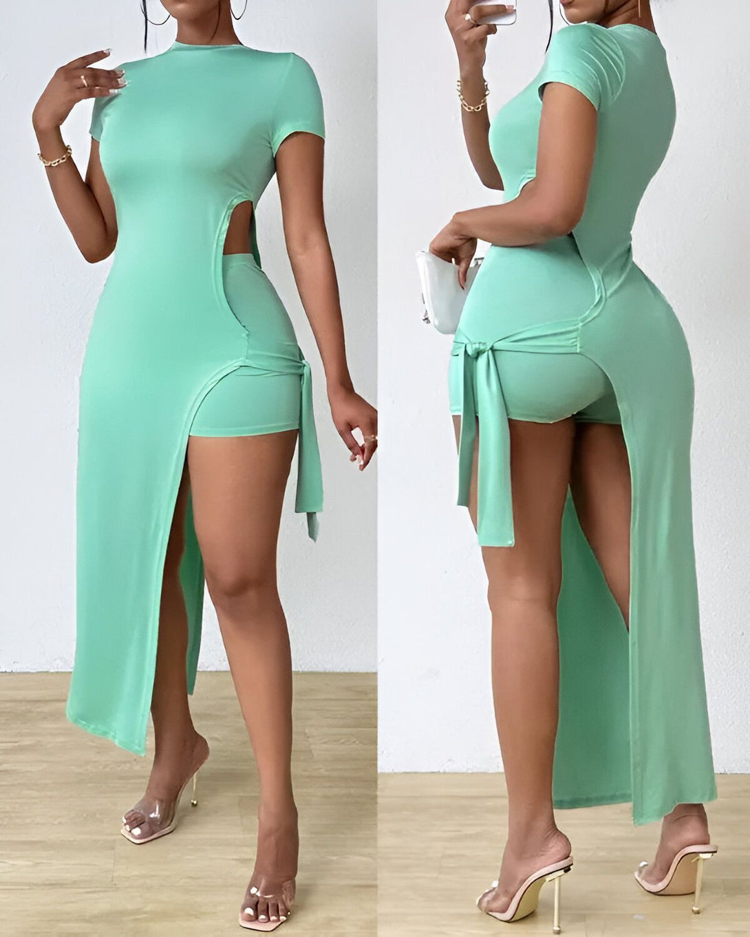 Une femme porte un ensemble short et haut vert menthe. Le haut est court et moulant, avec une découpe sur le côté et des liens à nouer. Le short est taille haute et échancré, avec une fente sur le côté. La femme porte des talons transparents et porte un sac à main blanc.