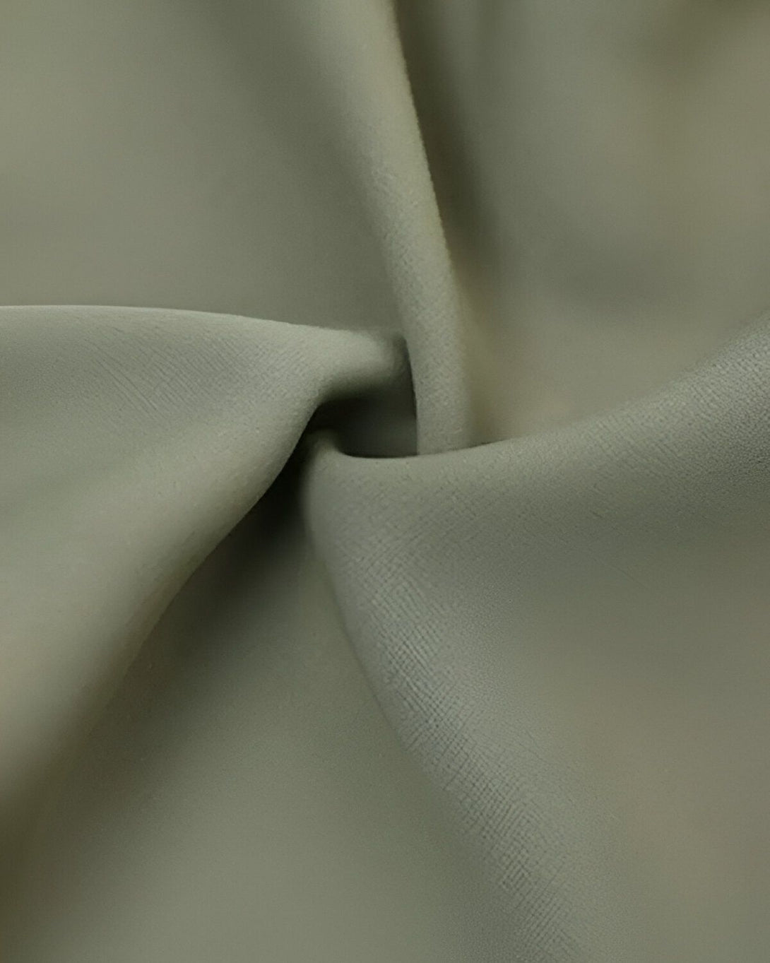 Une image d'un tissu vert olive froissé.