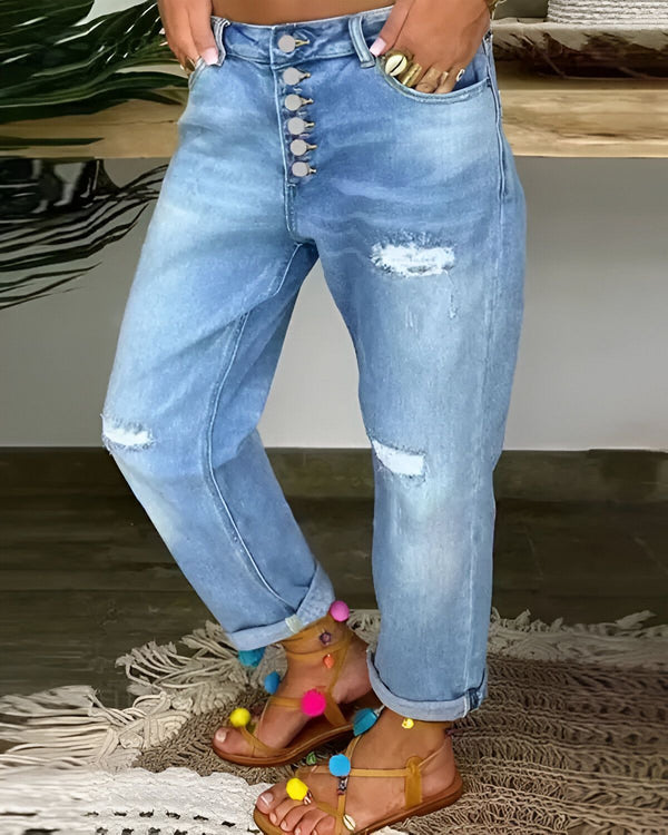 Jean taille basse déchiré à braguette boutonnée