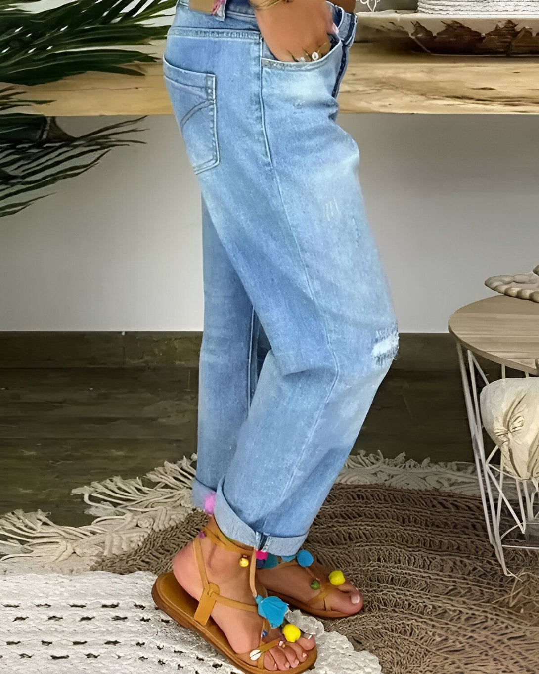 Jean taille basse déchiré à braguette boutonnée