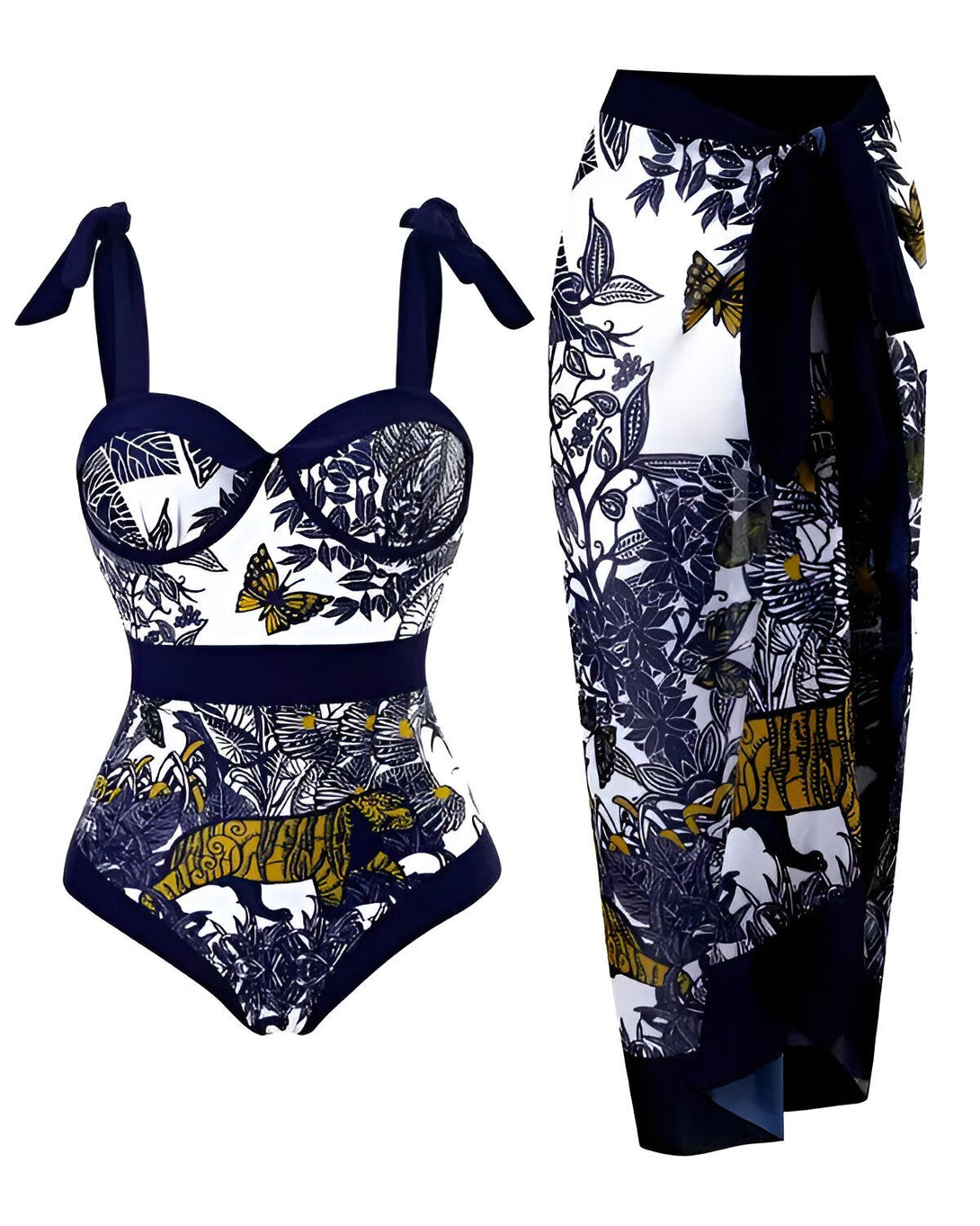 Un maillot de bain une pièce bleu et blanc avec un motif de feuilles et de fleurs tropicales. Le maillot de bain est échancré sur les côtés et possède des bretelles réglables. Il est accompagné d'une jupe longue portefeuille assortie.