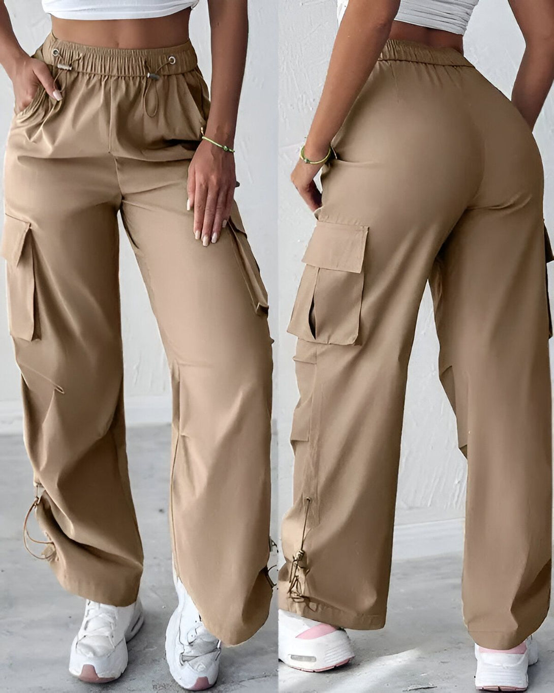 Une image d'une femme portant un pantalon cargo beige. Le pantalon est ample et a des poches cargo sur les côtés. La femme porte également un haut blanc et des baskets blanches.