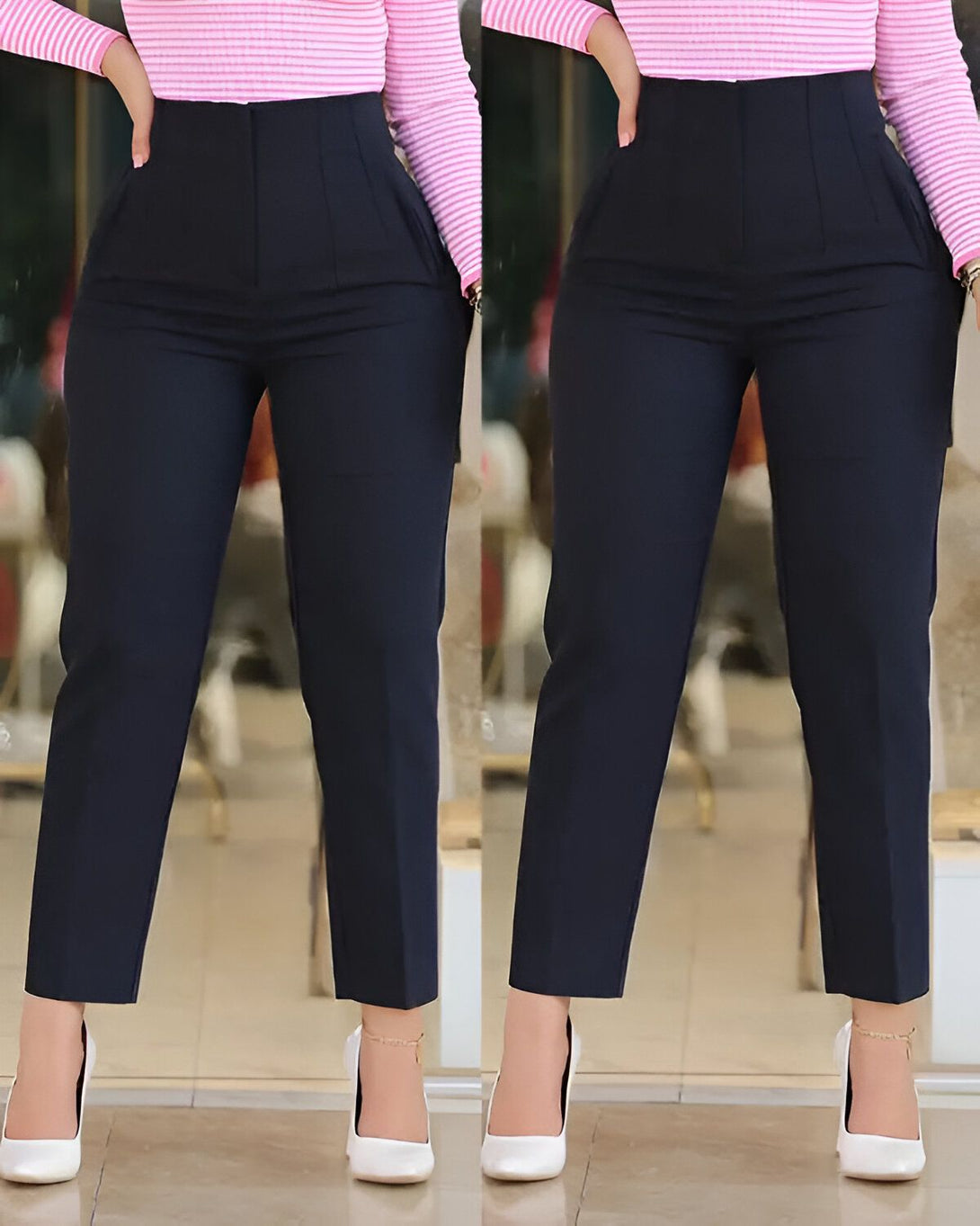 Une femme porte un pantalon de ville bleu marine taille haute avec une chemise rayée rose et blanche et des escarpins blancs.