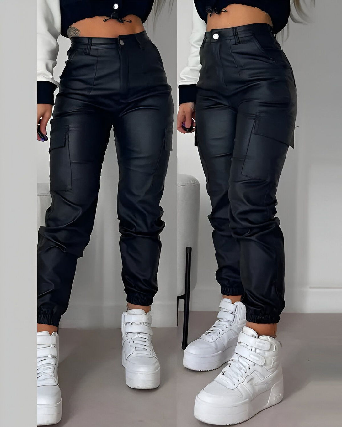 Une image d'une femme portant un pantalon cargo en similicuir noir. Le pantalon est taille haute et possède des poches cargo sur les côtés. La femme porte également un haut court noir et des baskets blanches.