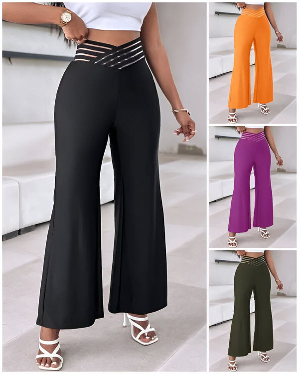 Une image de quatre femmes portant des pantalons évasés de différentes couleurs. Les pantalons sont noirs, orange, violet et vert olive. Les femmes sont toutes souriantes et semblent heureuses.