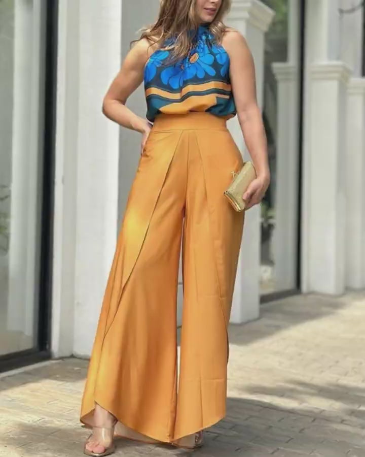 Video d'une femme portant : Ensemble haut à imprimé floral et pantalon large superposé