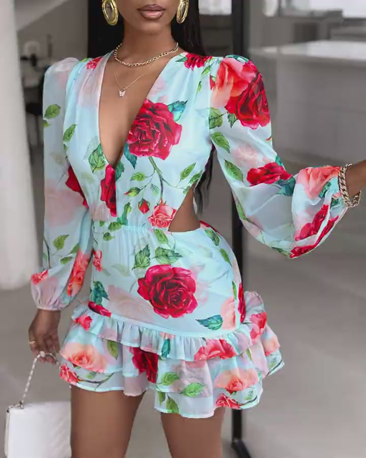 Video d'une femme portant : Robe superposée à volants et imprimé floral