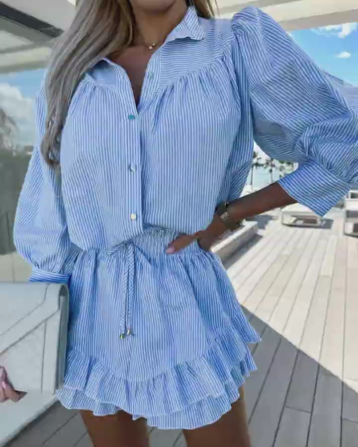Video d'une femme portant : Ensemble chemise boutonnée à manches lanterne et jupe-short à ourlet à volants