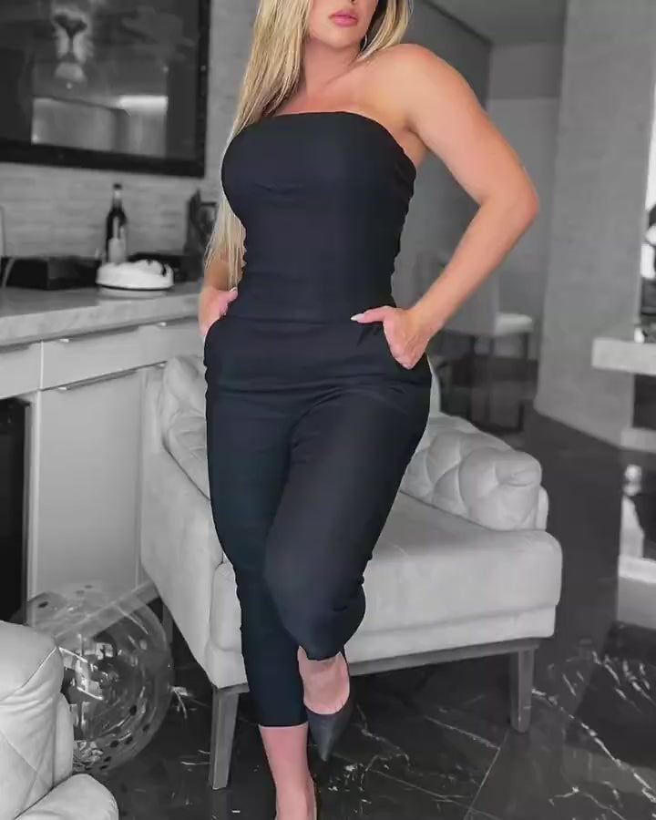 Video d'une femme portant : Combinaison bandeau à poche