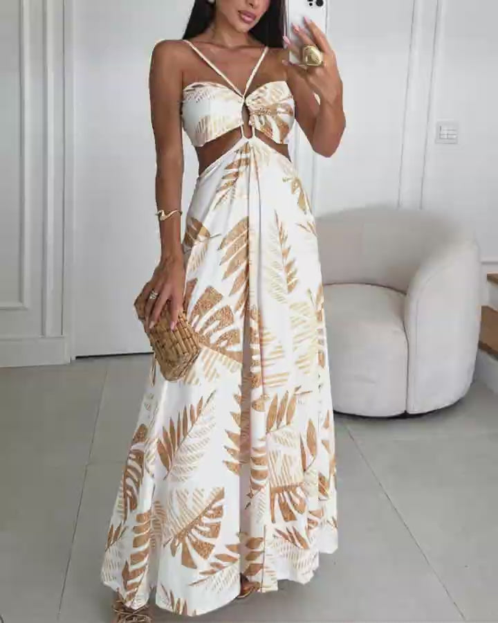 Video d'une femme portant : Robe longue dos nu à imprimé tropical