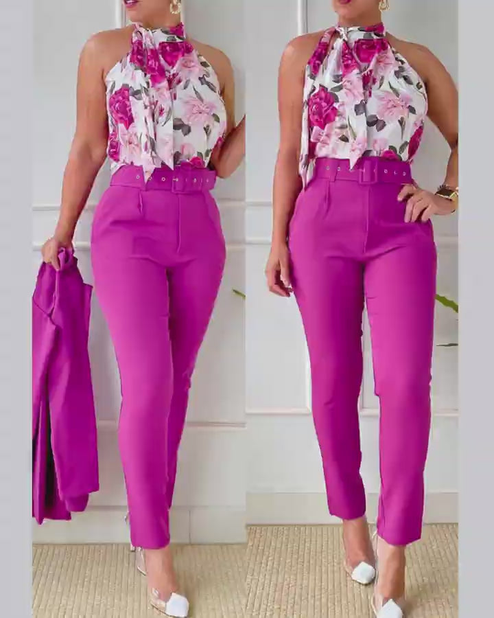 Video d'une femme portant : Ensemble débardeur à imprimé floral et pantalon taille haute avec ceinture