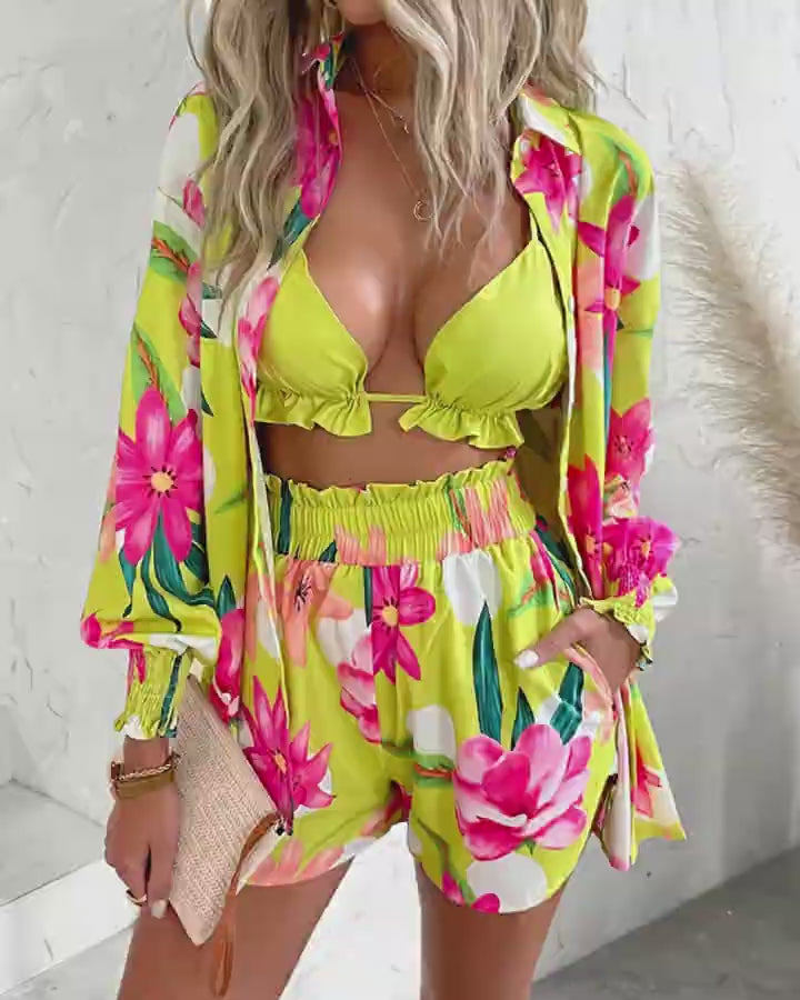 Video d'une femme portant : Ensemble chemise à manches lanterne et short à imprimé floral 3PCS avec haut court