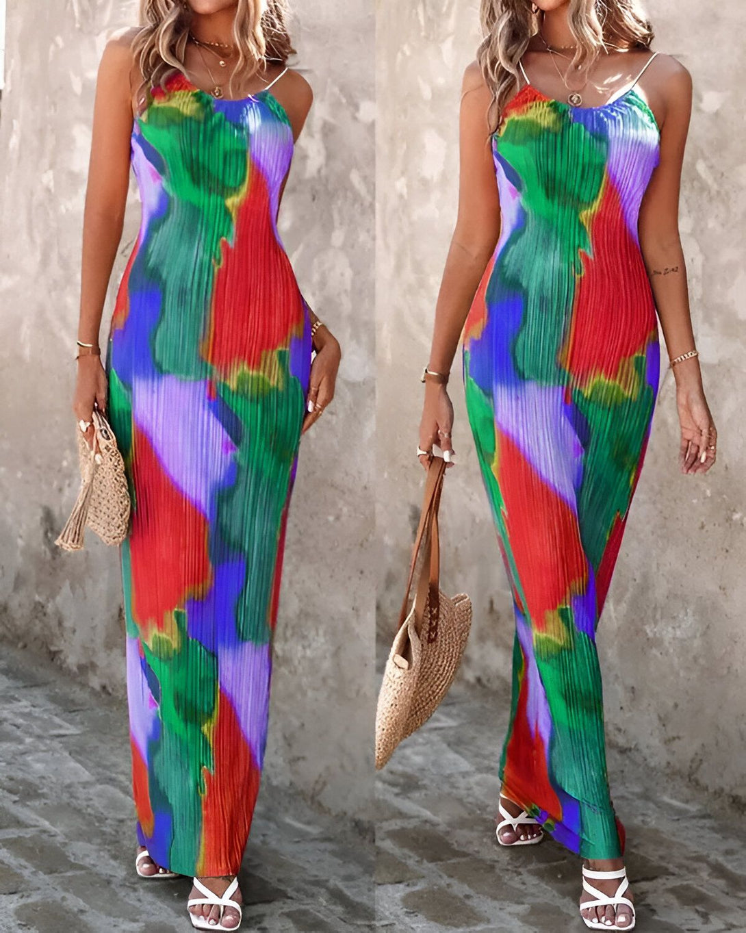 Une femme porte une robe longue et colorée. La robe est verte, rouge, violette et orange. La femme est debout et porte des sandales. Elle a un sac à main en osier à la main.