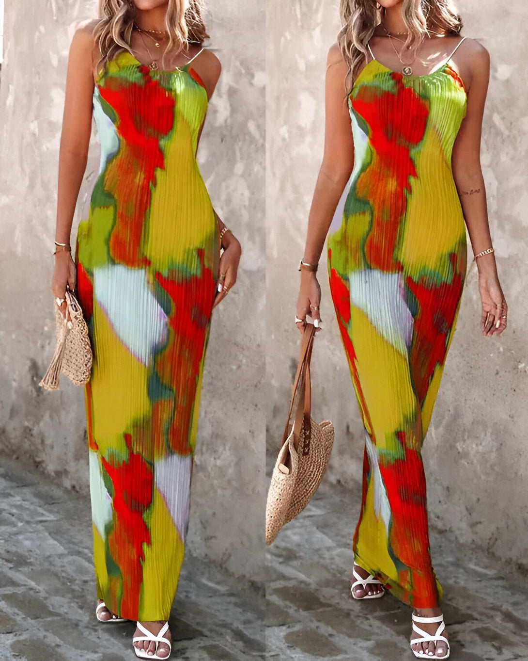 Une femme porte une robe longue jaune, rouge et verte. La robe est plissée et a des bretelles fines. La femme porte également un sac à main en osier marron.
