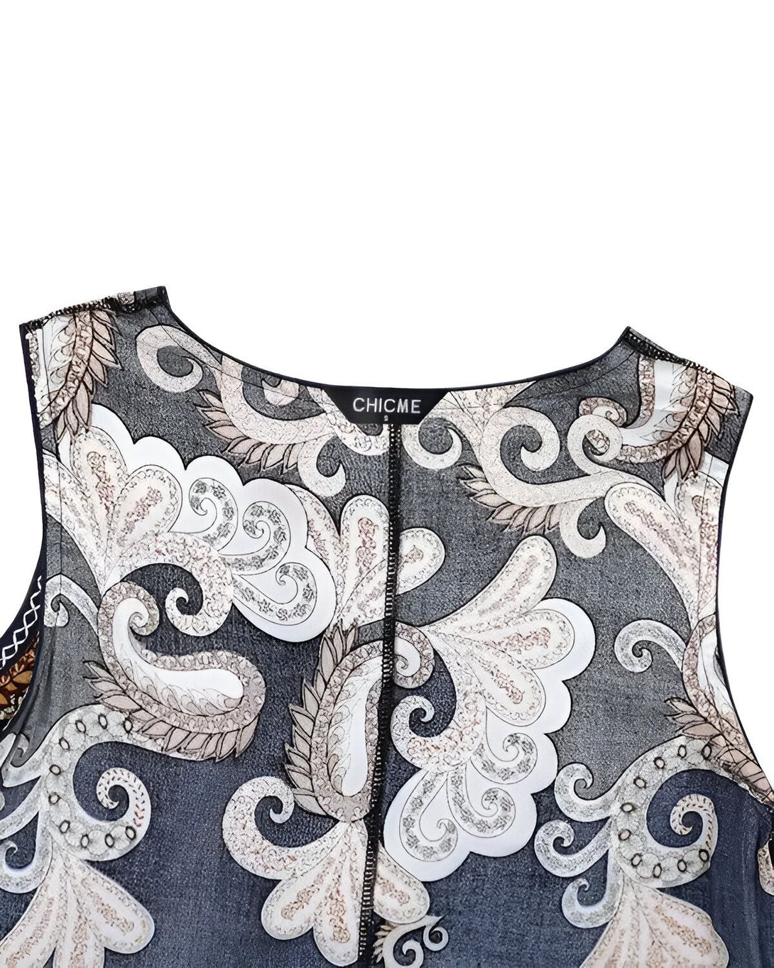 Une image d'une robe noire et blanche à motifs paisley. La robe est sans manches et possède une encolure ronde.