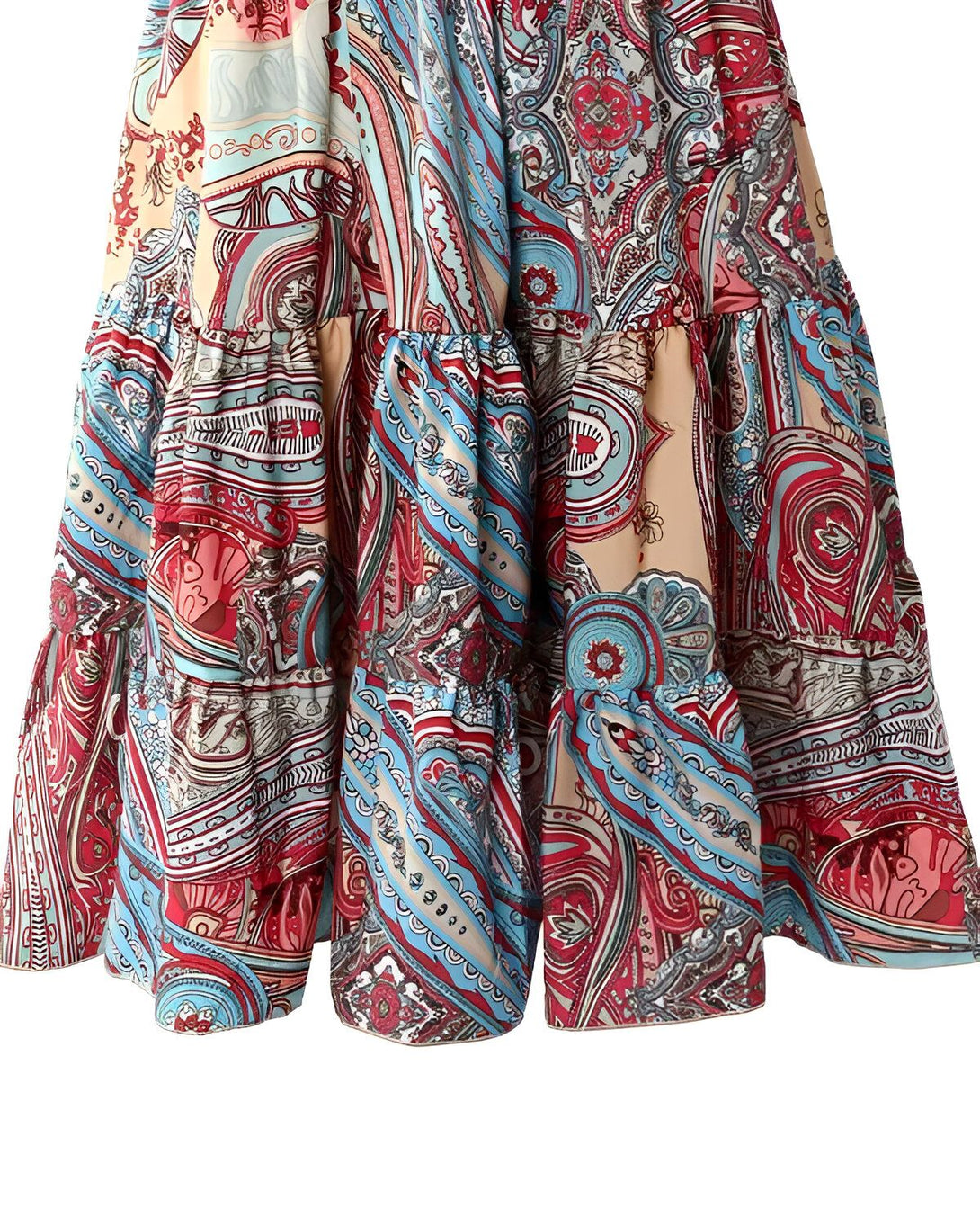 Une image d'une robe longue et ample à motifs cachemire. La robe est de couleur rouge, bleue et beige.