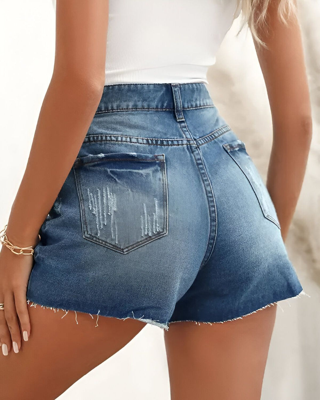 Short en jean déchiré avec ourlet brut et poches